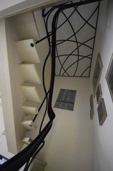 The walkway to the first floor. View of the skylight